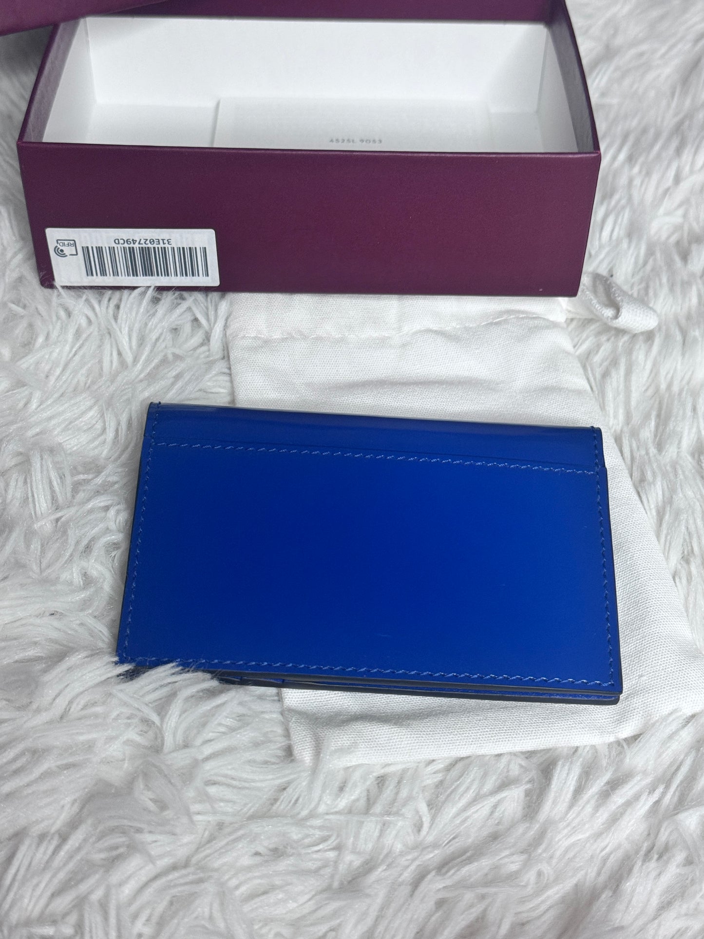 GUCCI Blue Leather Bi-Fold Embossed Card Case